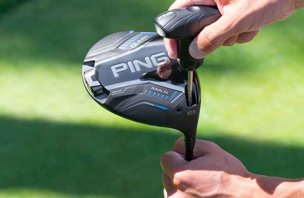 Fitter adjusting a driver